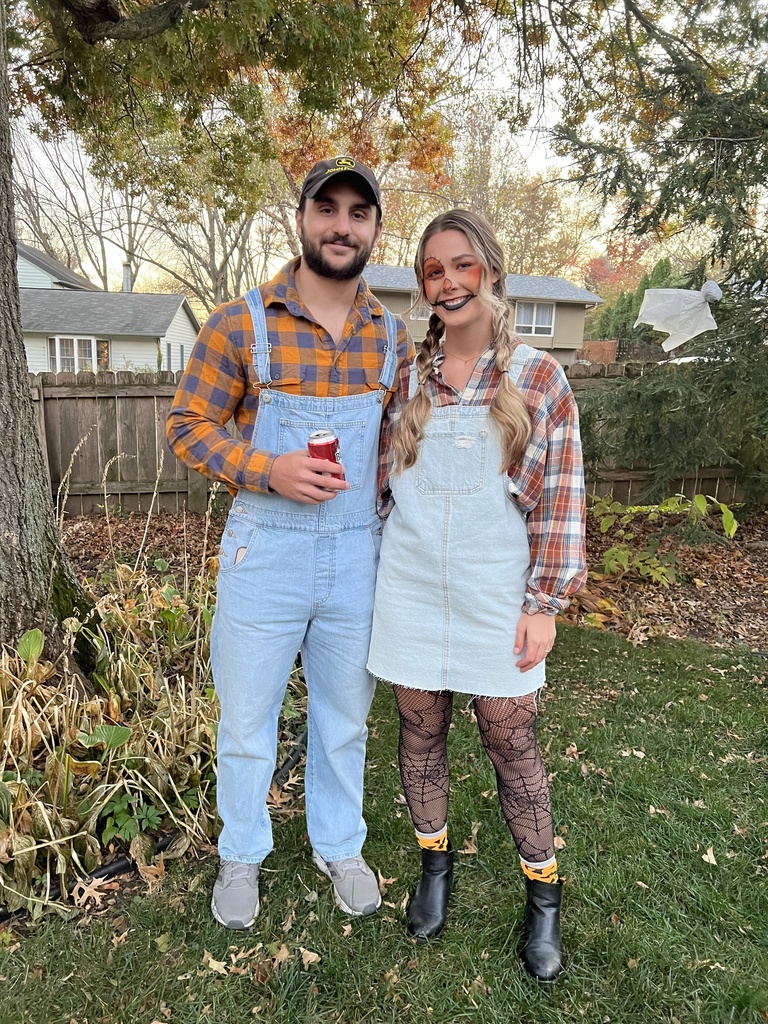 Lyndy and her boyfriend dressed as scarecrows